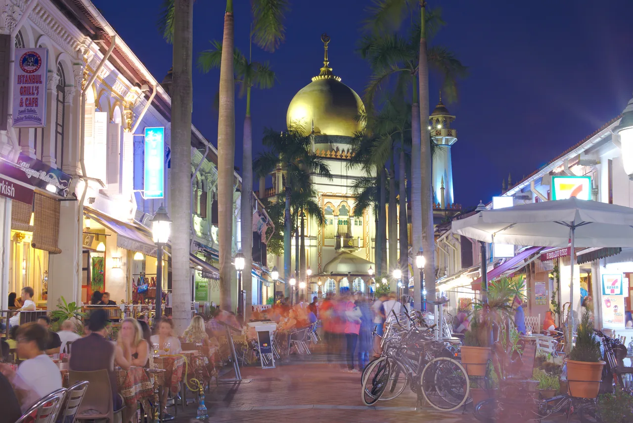 The golden dome of the Sultan Mosque rising above Bussorah Street in Kampong Glam, Singapore The golden dome of the Sultan Mosque rising above Bussorah Street in Kampong Glam, Singapore