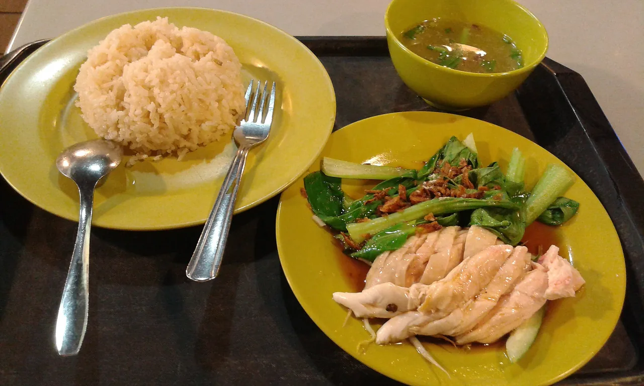A plate of Hainanese chicken rice, Singapore's national dish A plate of Hainanese chicken rice, Singapore's national dish