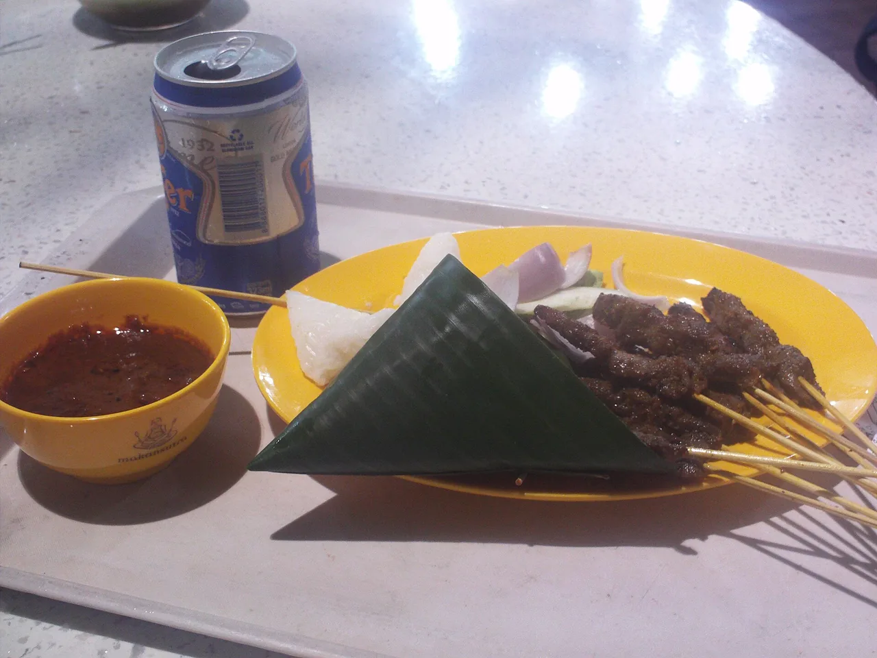 A plate of satay skewers with peanut sauce, Singapore A plate of satay skewers with peanut sauce, Singapore