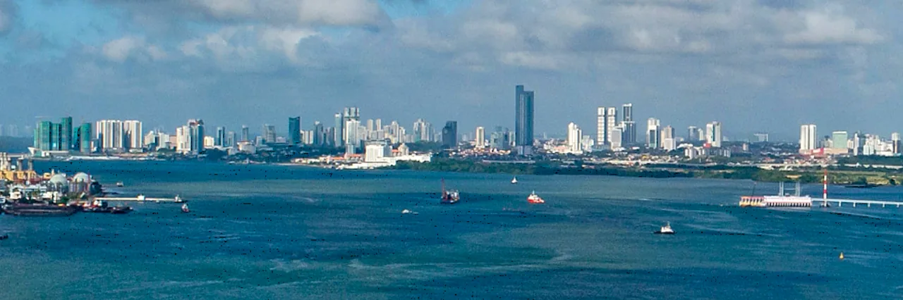 Johor Bahru city skyline seen across the water from Singapore