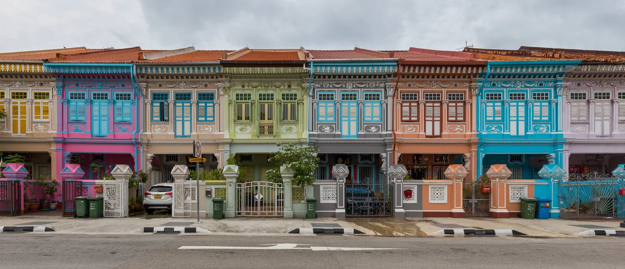 A row of brightly painted pastel Peranakan shophouses on Koon Seng Road in Joo Chiat, Singapore