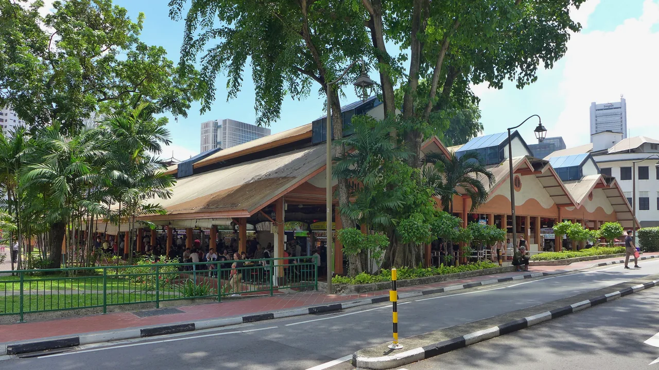 A Singapore hawker centre with stalls and diners