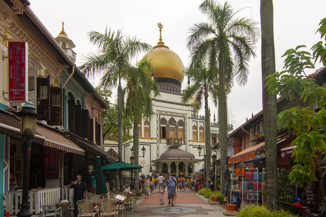 Sultan Mosque with its golden dome seen down Bussorah Street in Kampong Glam, Singapore