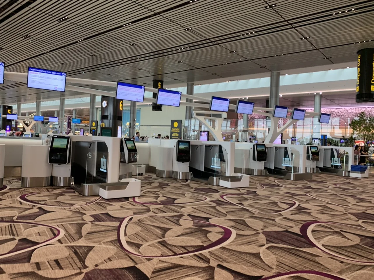Automated check-in and immigration kiosks at Singapore Changi Airport's Terminal 4