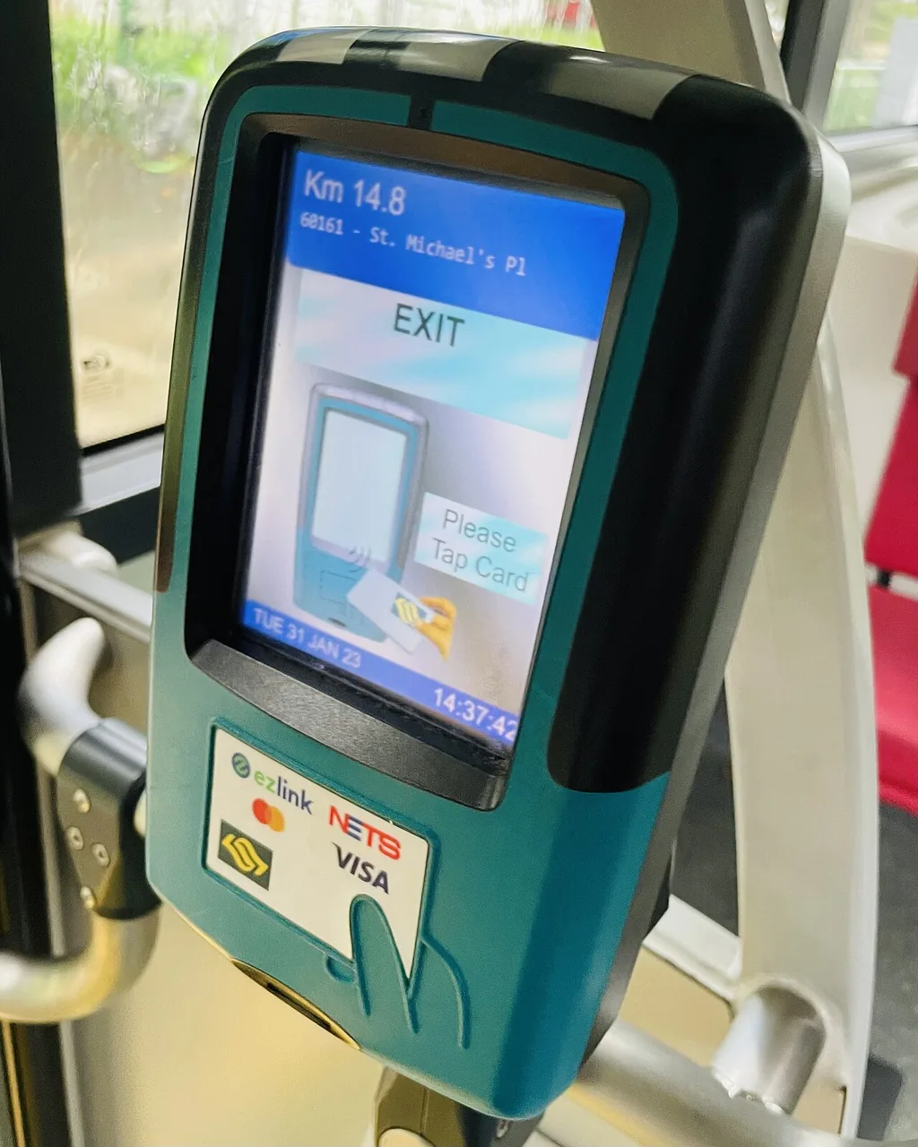 Tapping an EZ-Link contactless card at a reader in Singapore Tapping an EZ-Link contactless card at a reader in Singapore