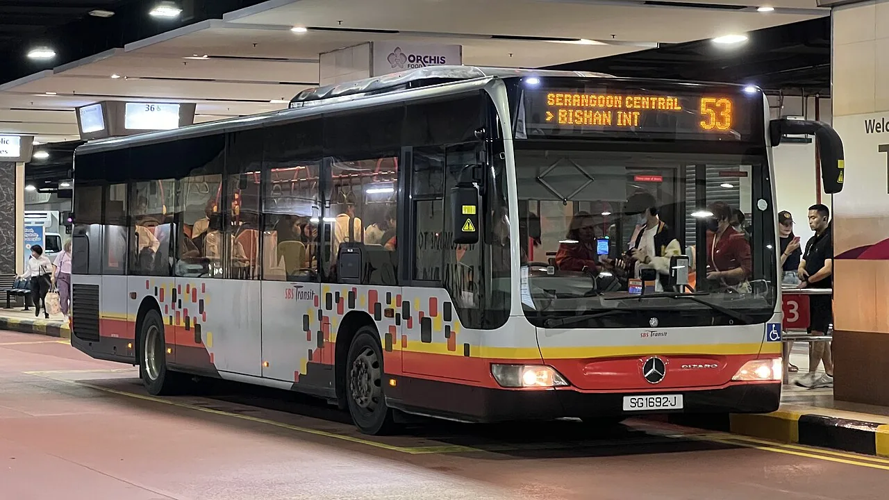 Public bus on a street in Singapore Public bus on a street in Singapore