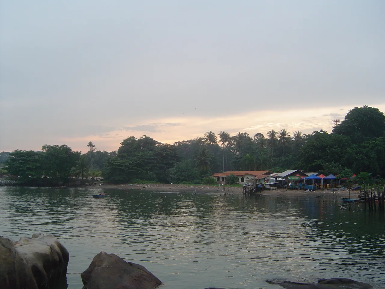 The village settlement on Pulau Ubin, seen from across the water at dusk