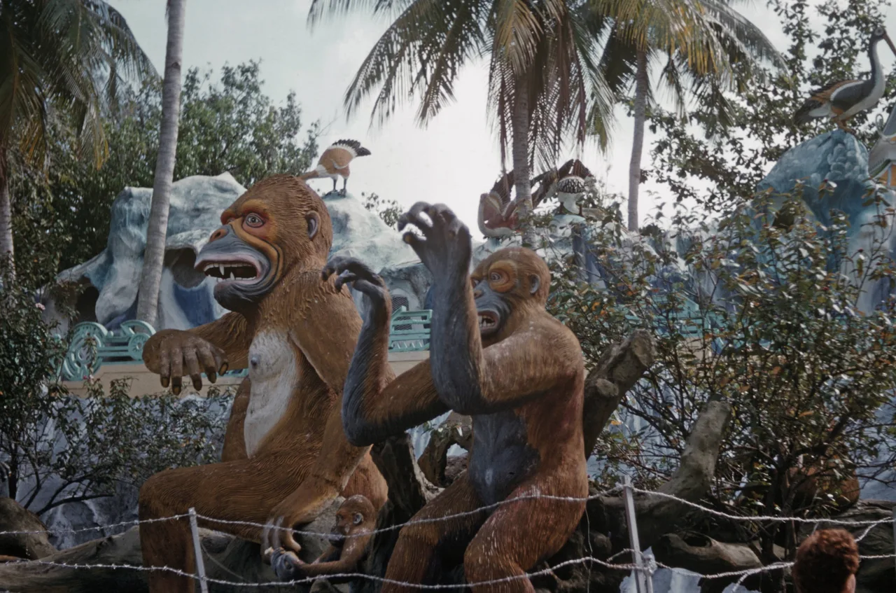 An archive photograph of two large ape statues among palms at Tiger Balm Gardens in 1963