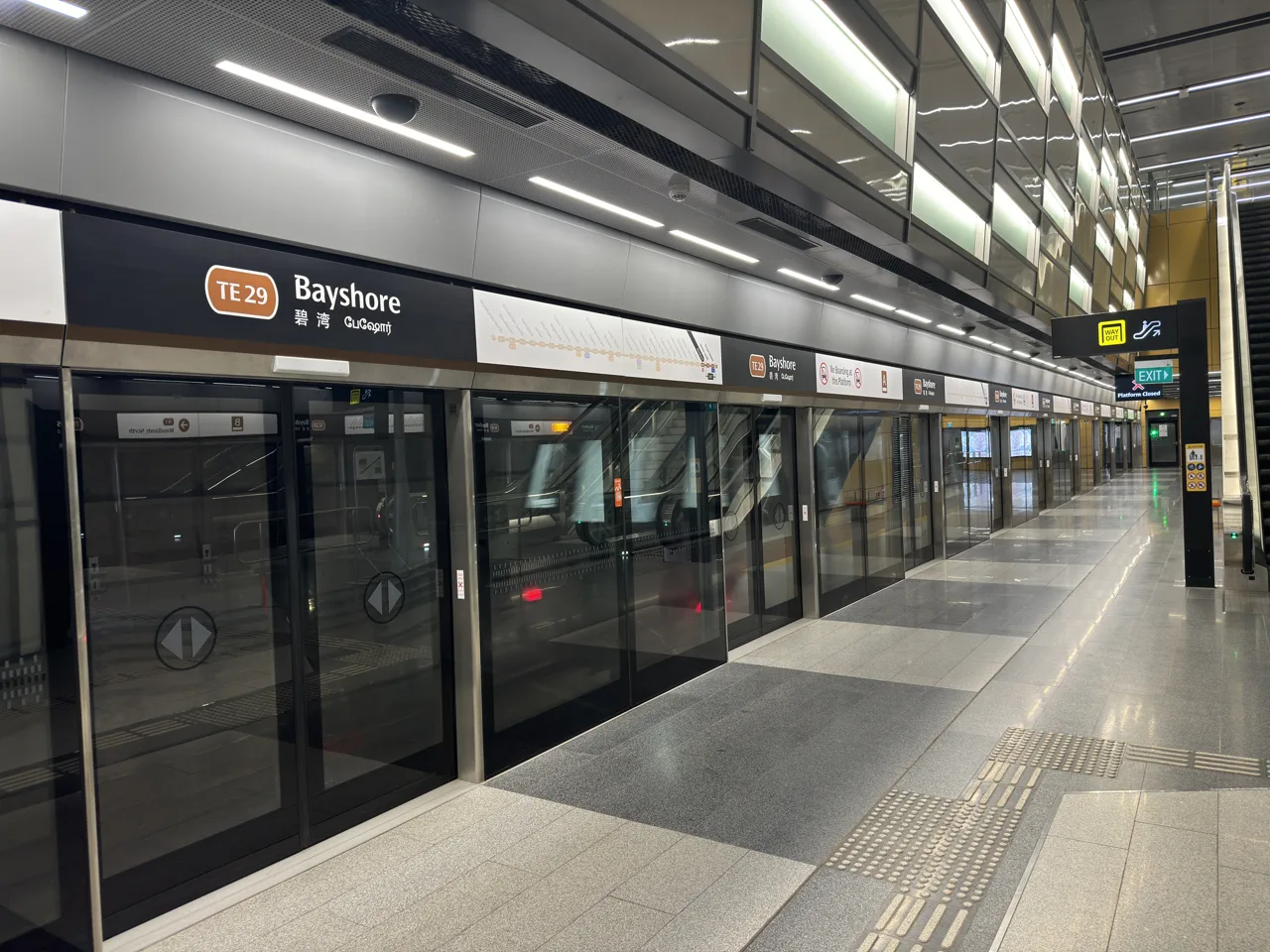 A Thomson-East Coast Line platform with screen doors and a train standing at Bayshore station A Thomson-East Coast Line platform with screen doors and a train standing at Bayshore station