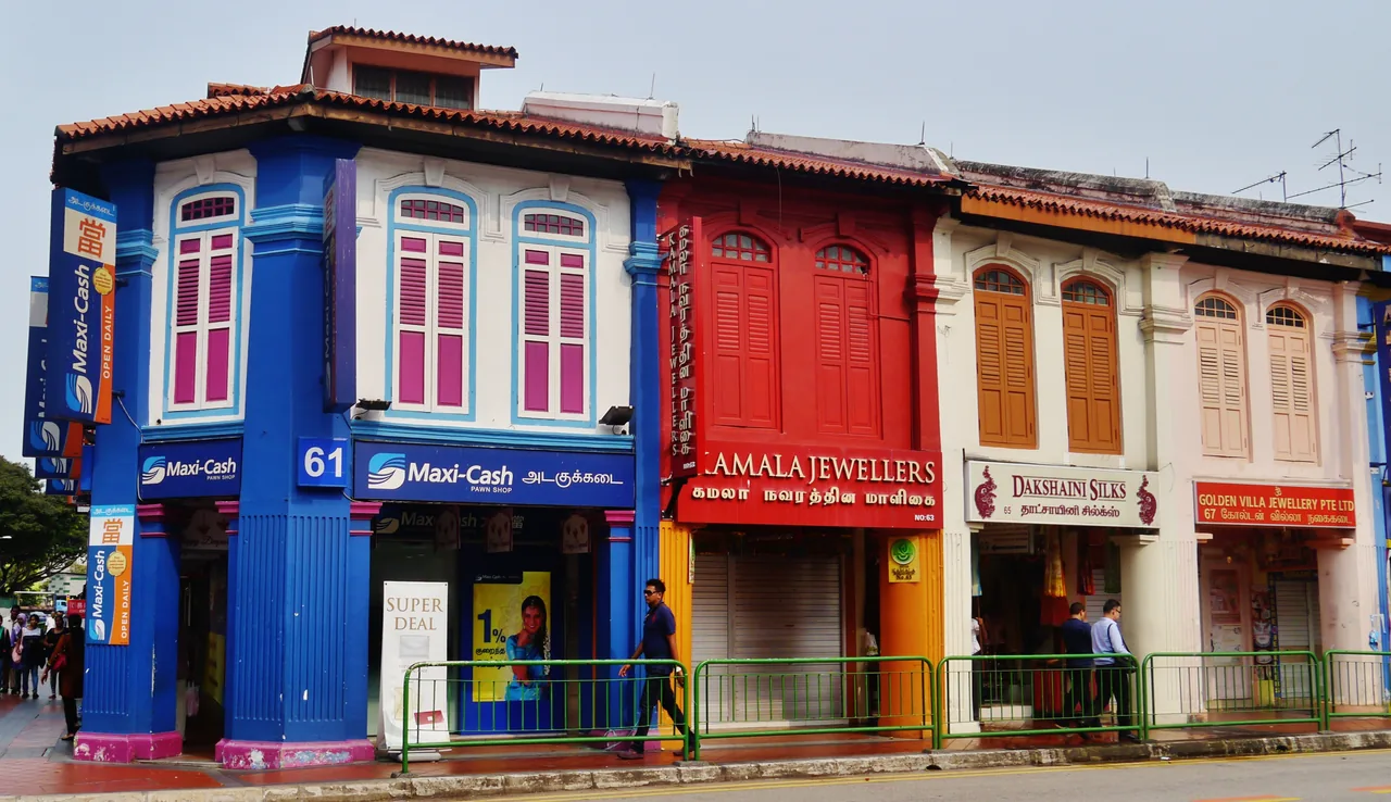 A row of brightly painted shophouses on Serangoon Road in Little India, Singapore