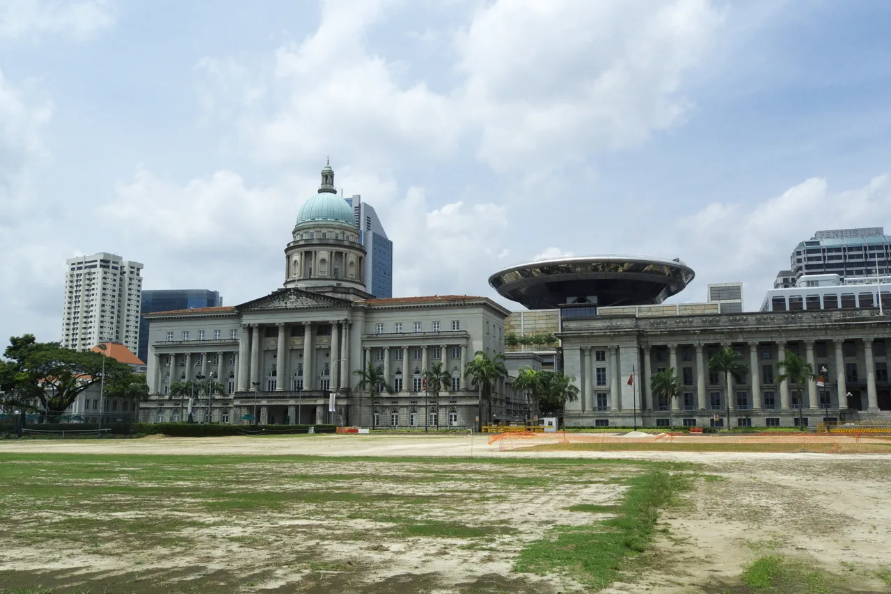 The green dome of the former Supreme Court beside the former City Hall, seen across the Padang